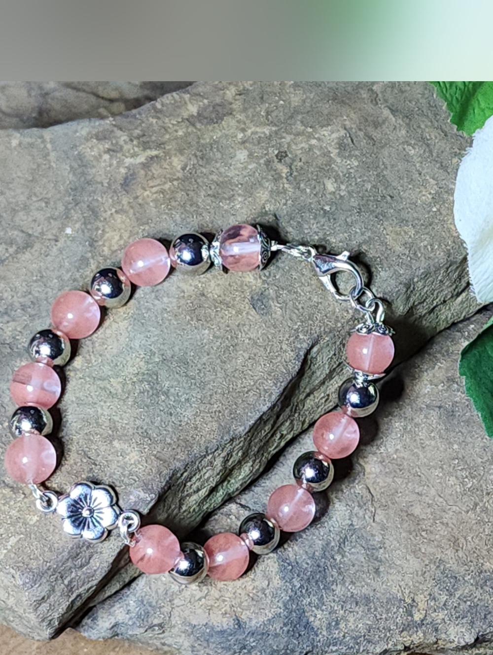 Hand Crafted Pink and Silver Toned Beaded Bracelet With Flower Accent